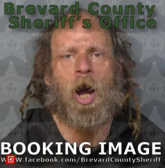 Booking photo of Christopher Marlowe, who wore a Ronald McDonald-like costume when arrested for felony resisting officers in Palm Bay, Florida.