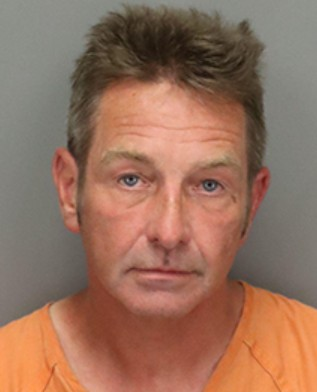 Booking photo of Vincent Conroy, charged with open container and public exposure after giving a false name to police in Florida.