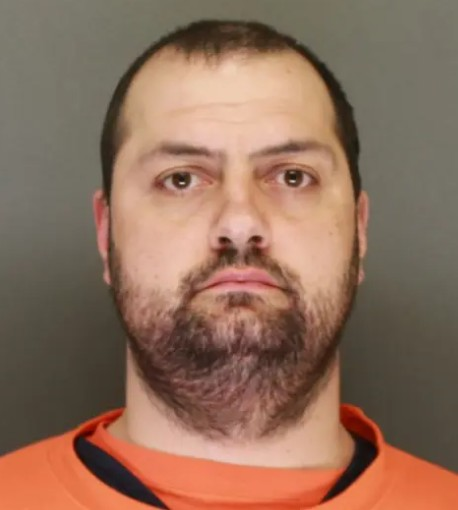 Mugshot of David Bruce Delong, 40, charged with the sledgehammer murder of co-worker Amber Czech in Cokato, MN.