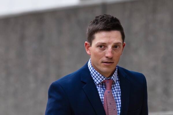 Former Grand Rapids Police officer Christopher Schurr enters the Kent County Courthouse in Grand Rapids, Mich., May 2, 2025. (Joel Bissell/Kalamazoo Gazette via AP, File)