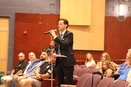 Chester County District Attorney Chris de Barrena-Sarobe speaks in full support of local police in Oxford during the Monday evening public meeting at Penn’s Oak School on South Fifth Street. There is another meeting Wednesday night. (JEN SAMUEL  — DAILY LOCAL NEWS)