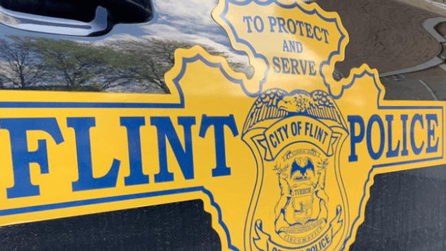 Case-related image from a cited source for “Two Suspects Charged in Fatal Flint Shooting.”